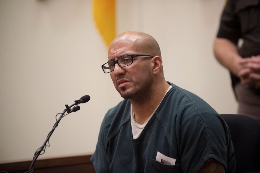 Federico Luis Cruz testifies before Judge Dennis Leiber at the Kent County Courthouse on Monday, Nov. 5, 2018. Cruz , serving life in prison without parole for killing and decapitating a teen in 1996 and mutilating the head in front of a video camera is getting a chance at a new sentence. (Neil Blake/The Grand Rapids Press via AP)