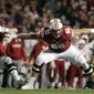 In this Oct. 6, 2018, file photo, Wisconsin&#39;s Beau Benzschawel blocks during the first half of an NCAA college football game against Nebraska in Madison, Wis. (AP Photo/Morry Gash, File)