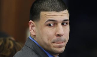 FILE - In this Friday, April 14, 2017, file photo, former New England Patriots tight end Aaron Hernandez turns to look in the direction of the jury as he reacts to his double murder acquittal in the 2012 deaths of Daniel de Abreu and Safiro Furtado, at Suffolk Superior Court in Boston. On Thursday, Nov. 8, 2018, Massachusetts&#39; Supreme Judicial Court will consider whether the state should get rid of the centuries-old legal principle that erased Hernandez&#39;s murder conviction after he killed himself in prison. (AP Photo/Stephan Savoia, Pool, File)