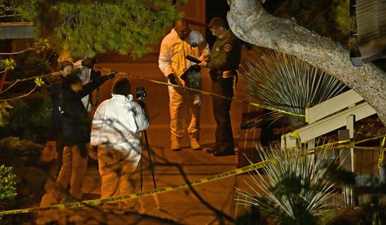 A forensics team works the scene Thursday, Nov. 8, 2018, in Thousand Oaks, Calif. where a gunman opened fire Wednesday inside a country dance bar crowded with hundreds of people on &amp;quot;college night,&amp;quot; wounding 11 people including a deputy who rushed to the scene. Ventura County sheriff&#39;s spokesman says gunman is dead inside the bar. (AP Photo/Mark J. Terrill)