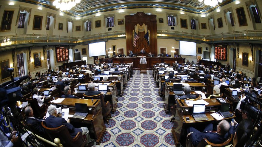 FILE - In this Wednesday, July 8, 2015, file photo, Rep. Mike Pitts, R-Laurens, speaks on the floor of the South Carolina House in Columbia, S.C. Even in a deeply red state like South Carolina, where all statewide offices are held by Republicans, Democrats are making some inroads in the legislature. South Carolina Democrats on Tuesday, Nov. 6, 2018, wrested two state House seats from Republican incumbents. (AP Photo/John Bazemore, File)