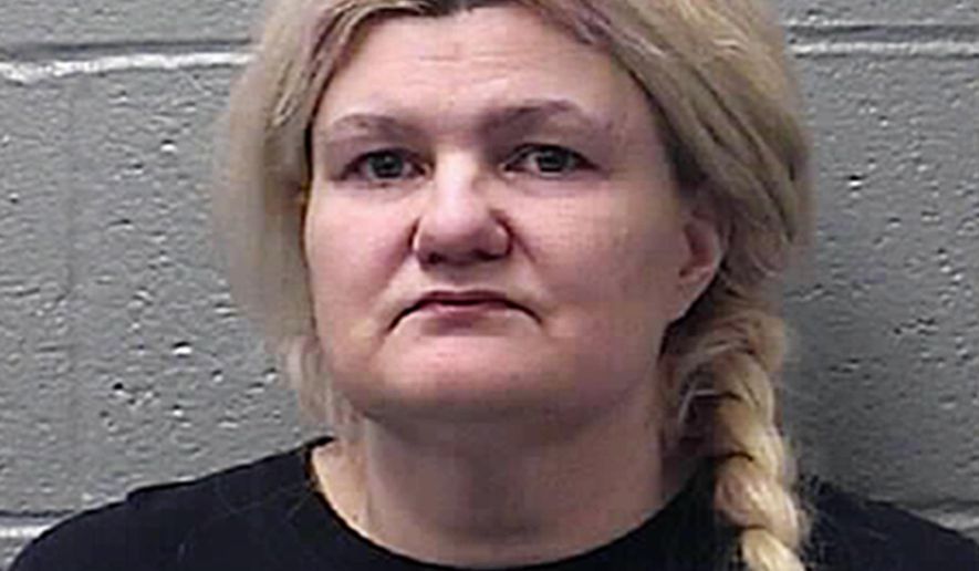 This photo provided by the St. Francois County Sheriff's Department in Farmington, Mo., shows Malissa Ancona, who faces first-degree murder charges in the February 2017 death of Frank Ancona, who called himself an "imperial wizard" of the Ku Klux Klan. Ancona last year agreed to testify against her son, whom she originally blamed in the shooting but in a Sept. 26, 2018, letter to a judge says that she, not her son, pulled the trigger. (St. Francois County Sheriff's Department via AP)