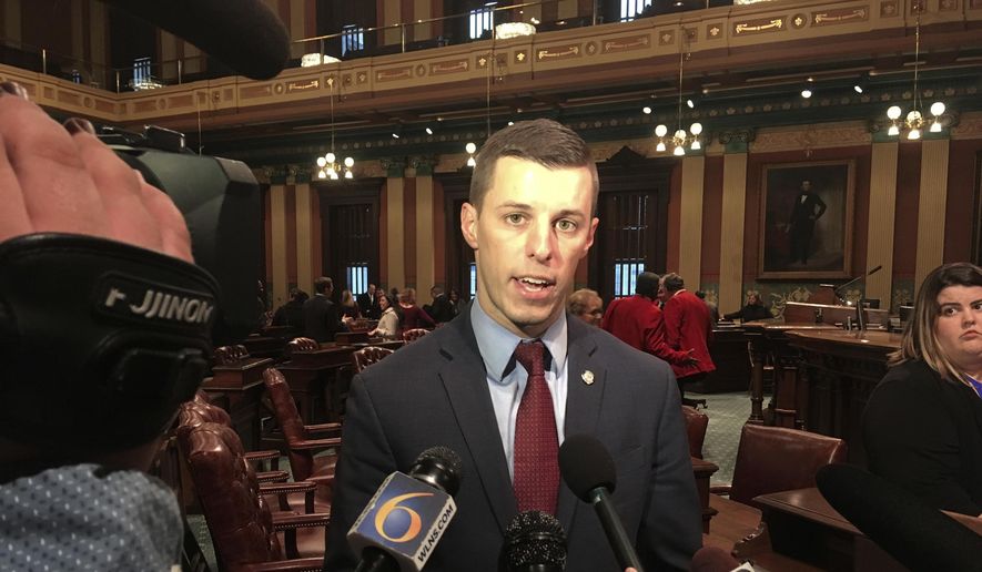Republican Rep. Lee Chatfield of Levering speaks with reporters on Thursday, Nov. 8, 2018, at the state Capitol in Lansing, Mich., after being chosen as the next House speaker. (AP Photo/David Eggert)