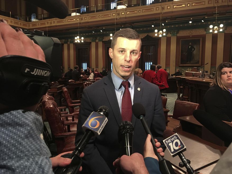 Republican Rep. Lee Chatfield of Levering speaks with reporters on Thursday, Nov. 8, 2018, at the state Capitol in Lansing, Mich., after being chosen as the next House speaker. (AP Photo/David Eggert)