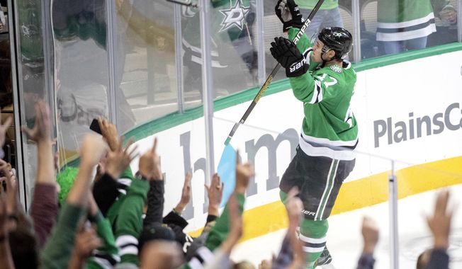 Dallas Stars center Devin Shore celebrates his second goal against the San Jose Sharks, during the third period of an NHL hockey game Thursday, Nov. 8, 2018, in Dallas. Dallas won 4-3. (AP Photo/Jeffrey McWhorter)