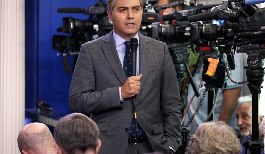 FILE - In this Aug. 2, 2018 file photo, CNN correspondent Jim Acosta does a stand up before the daily press briefing at the White House in Washington. The White House on Wednesday suspended the press pass of CNN correspondent Jim Acosta after he and President Donald Trump had a heated confrontation during a news conference. (AP Photo/Evan Vucci, File)