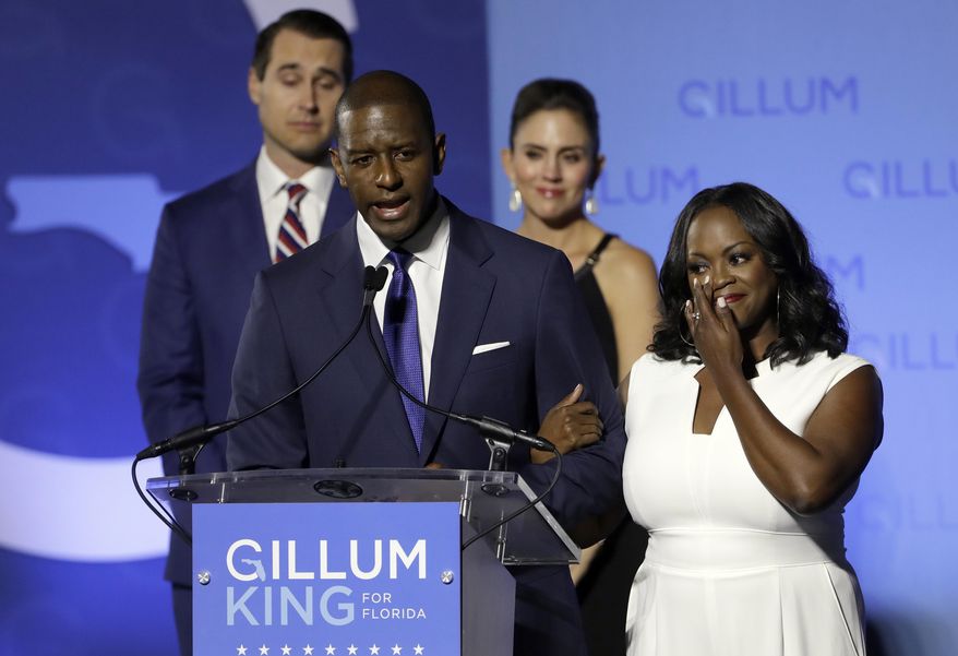 Florida Democratic gubernatorial candidate Andrew Gillum gives his concession speech as he is joined on stage by his wife R. Jai Gillum, right, and running mate Chris King and his wife Kristen Tuesday, Nov. 6, 2018, in Tallahassee, Fla. Gillum lost the Florida governor’s race to Republican Ron DeSantis. (AP Photo/Chris O&#39;Meara)