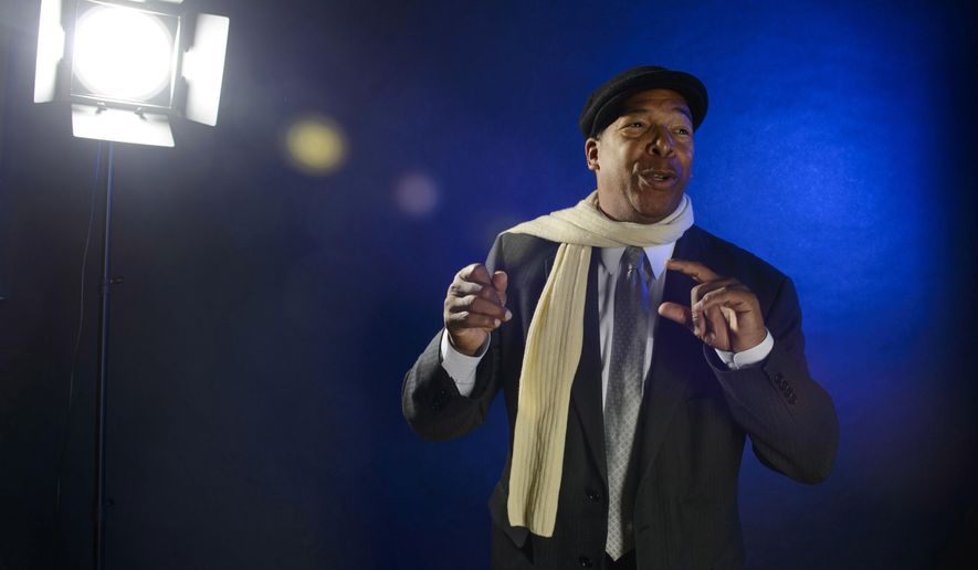 In this Oct. 30, 2018 photo, Terry Sanford teacher Brian Mayers performs a section of his play called &amp;quot;The Cycle&amp;quot; during a portrait session in Fayetteville, N.C. Mayers&#x27; play was produced in New York and performed during the United Solo Theatre Festival. His wife, Toni Henderson-Mayers, directed the play. (Melissa Sue Gerrits/The Fayetteville Observer via AP)