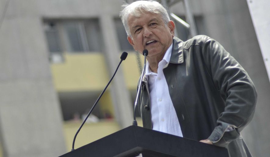 FILE - In this Sept. 29, 2018 file photo, Mexico&#x27;s President-elect Andres Manuel Lopez Obrador speaks at a rally commemorating the 50th anniversary of a bloody reprisal against students, at the Tlatelolco Plaza in Mexico City. Mexican stocks appeared headed for a second day of losses on Friday, Nov. 9, 2018, after Lopez Obrador floated a proposal to prohibit some commissions charged by private banks. (AP Photo/Christian Palma, File)