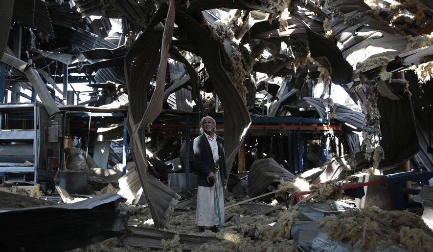 FILE - In this Sept. 22, 2016, file photo, a man stands among the rubble of the Alsonidar Group&#39;s water pump and pipe factory after it was hit by Saudi-led airstrikes in Sanaa, Yemen. The Saudi-led coalition fighting in Yemen said early Saturday, Nov. 10, 2018, it had &amp;quot;requested cessation of inflight refueling&amp;quot; by the U.S. for its fighter jets after American officials said they would stop the operations amid growing anger over civilian casualties from the kingdom&#39;s airstrikes. (AP Photo/Hani Mohammed, File)