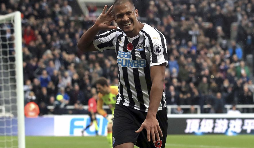 Newcastle United&#39;s Salomon Rondon celebrates scoring his side&#39;s second goal of the game during the English Premier League soccer match between Newcastle United and AFC Bournemouth at St James Park stadium, Newcastle, England. Saturday Nov. 10 2018 (Owen Humphreys/PA via AP)
