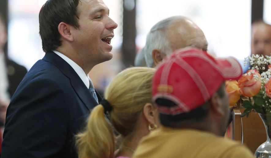 Presumed Governor-elect Ron DeSantis, left, tours Aldo Surgical & Hospital Supply Inc., Thursday, Nov. 8, 2018, in Hialeah Gardens, Fla. (AP Photo/Wilfredo Lee)