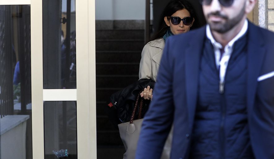 Rome mayor Virginia Raggi leaves her house, in Rome, Saturday, Nov. 10, 2018. A verdict is expected within hours for Rome&#39;s mayor, on trial in the Italian capital for allegedly lying about a City Hall hire.(Riccardo Antimiani/ANSA via AP)