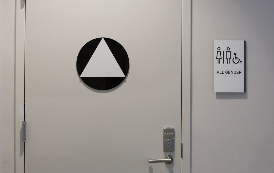 An all-gender restroom is seen at the new Golden 1 Center, Thursday, Sept. 29, 2016, in Sacramento, Calif. Calif. Gov. Jerry Brown signed legislation Thursday requiring California businesses and governments to post non-gender-specific signs on single-occupant restrooms by March 1, 2017. The Golden 1 Center, the new home of the NBA's Sacramento Kings, will have 23 single-occupancy restrooms labeled "all gender." (AP Photo/Rich Pedroncelli)