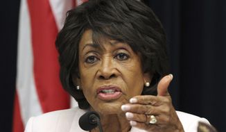FILE - In this June 27, 2018, file photo Rep. Maxine Waters, D-Calif., asks a question of Housing and Urban Development Secretary Ben Carson, during a hearing on Capitol Hill in Washington. (AP Photo/Jacquelyn Martin, File)