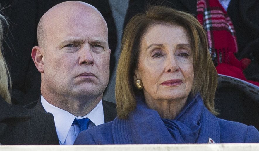 Acting United States Attorney General Matt Whitaker, left, and House Minority Leader Nancy Pelosi of Calif. attend the National Veterans Day Observance at Arlington National Cemetery in Arlington, Va., Sunday, Nov. 11, 2018. (AP Photo/Cliff Owen)