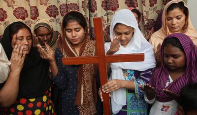 Pakistan Christians pray for Asia Bibi, a Catholic mother of five who has been on death row since 2010 accused of blasphemy in Multan, Pakistan. Wednesday, Oct. 31, 2018. Pakistan&#39;s top court on Wednesday acquitted Bibi who was sentenced to death under the country&#39;s controversial blasphemy law, a landmark ruling that sparked protests by hard-line Islamists and raised fears of violence. (AP Photo/Irum Asim)