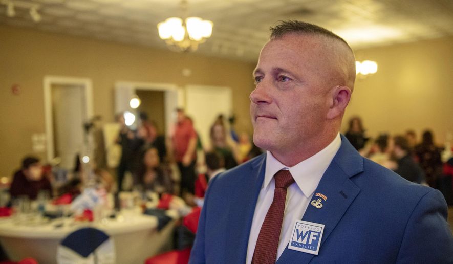 Richard Ojeda, Democratic candidate for West Virginia&#x27;s 3rd Congressional District, watches election results during his campaign&#x27;s watch party at Special Occasions in Yuma, near Logan, W.Va., Tuesday, Nov. 6, 2018. (Dylan Vidovich/The Logan Banner via AP)