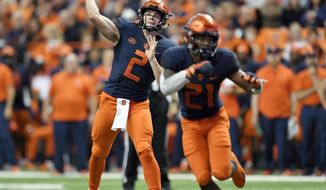 Syracuse quarterback Eric Dungey (2) throws a pass from the pocket during the second half of an NCAA college football game against Louisville in Syracuse, N.Y., Friday, Nov. 9, 2018. (AP Photo/Adrian Kraus)