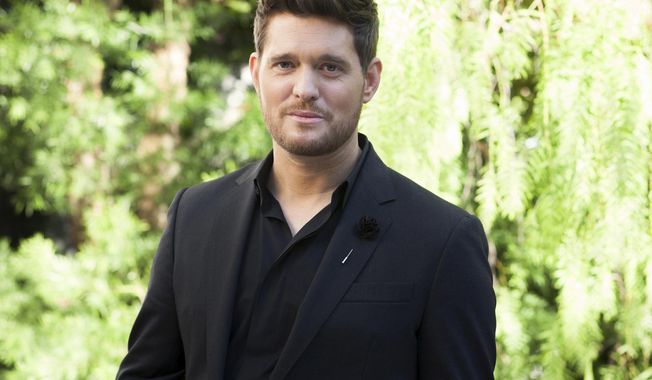 In this Oct. 16, 2018 photo, Michael Buble poses for a portrait at the Sunset Marquis in Los Angeles to promote his 10th album "Love," out on Friday, Nov. 16.  (Photo by Rebecca Cabage/Invision/AP)