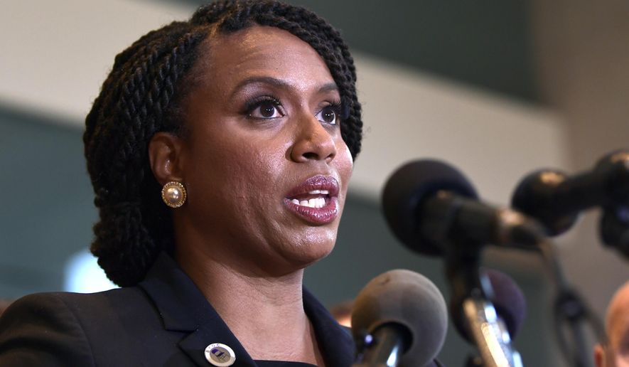 Rep.-elect Ayanna Pressley, D-Mass., listens during a news conference with members of the Progressive Caucus in Washington, Monday, Nov. 12, 2018. (AP Photo/Susan Walsh)