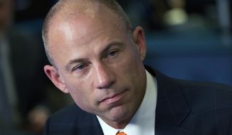 FILE - In this Thursday, May 10, 2018, file photo Michael Avenatti, is interviewed in New York. Avenatti is in police custody in Los Angeles following domestic violence allegation. (AP Photo/Mark Lennihan, File)