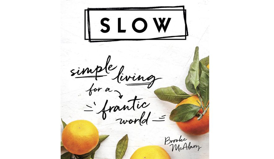 This cover image released by Sourcebooks shows "SLOW: Simple Living for a Frantic World" by Brooke McAlary. Consider a gift this holiday season that encourages a step back from chaos and stress of daily life. (AP Photo/Sourcebooks)