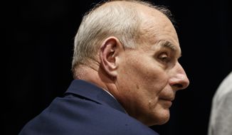 Then-White House Chief of Staff John Kelly looks on as President Donald Trump and first lady Melania Trump visit with Marines at Marine Barracks Washington, Thursday, Nov. 15, 2018, in Washington. (AP Photo/Evan Vucci) ** FILE **