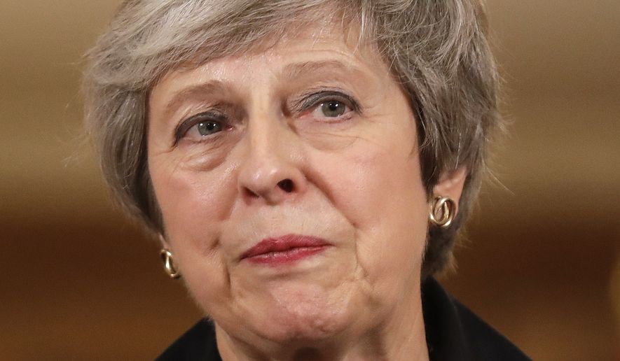 Britain&#39;s Prime Minister Theresa May speaks during a press conference inside 10 Downing Street in London, Thursday, Nov. 15, 2018. (AP Photo/Matt Dunham, Pool)