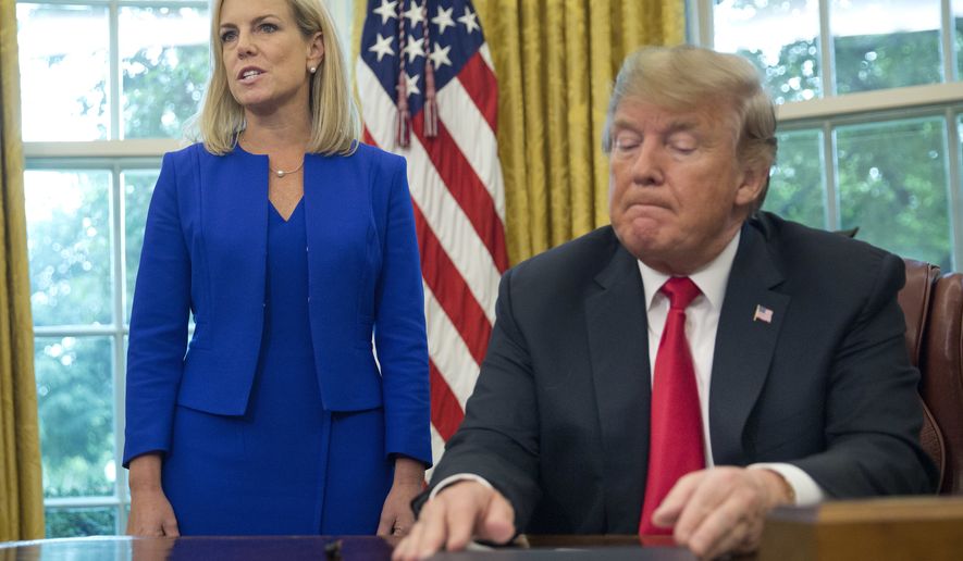 FILE - In this June 20, 2018, file photo, President Donald Trump, right, listens as Homeland Security Secretary Kirstjen Nielsen, left, addresses members of the media before Trump signs an executive order to end family separations at the border, during an event in the Oval Office of the White House in Washington. Trump and Nielsen never did quite click personally as the president chafed at her explanations of complicated immigration issues and her inability to bring about massive changes at the U.S.-Mexico border With Nielsens departure now considered inevitable, her eventual replacement will find theres no getting around the immigration laws and court challenges that have thwarted the presidents hardline agenda. (AP Photo/Pablo Martinez Monsivais, File)