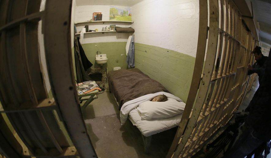 Shown is one of the cells that prisoners mounted a famous 1962 escape from, on Alcatraz Island Thursday, Nov. 15, 2018, in San Francisco. The FBI has created replicas of decoy heads used by prisoners to mount their infamous escape from Alcatraz. Authorities on Thursday unveiled 3D printed replicas of the decoys that inmates had constructed with soap, plaster and human hair to distract guards from their plan. Authorities say inmates Frank Morris and John and Clarence Anglin placed the decoys in their beds before climbing through the wall to escape the island prison in San Francisco Bay. The men were never found. (AP Photo/Eric Risberg)