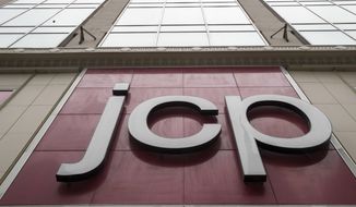 In this May 16, 2018, file photo, the J.C. Penney logo is seen hanging outside the Manhattan mall in New York. The department store announced on Feb. 6, 2019, that it would no longer sell major appliances in its stores. (AP Photo/Mary Altaffer)