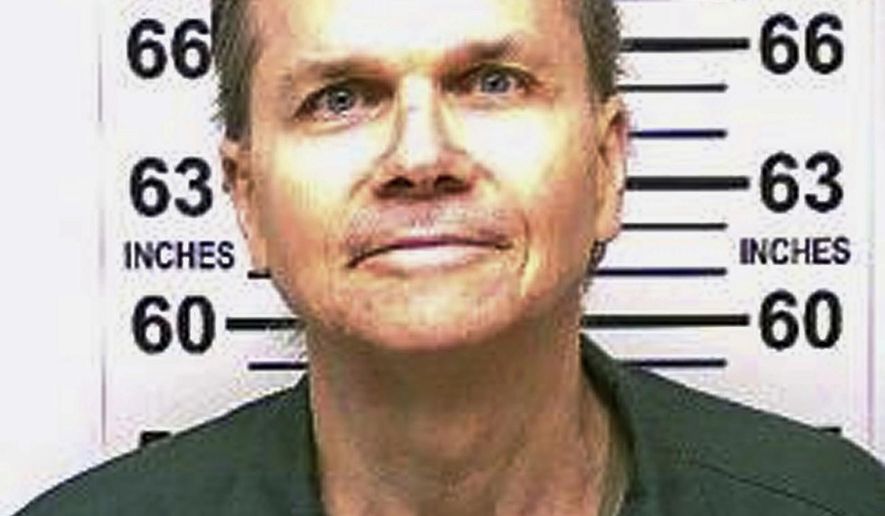 FILE- This Jan. 31, 2018, file photo, provided by the New York State Department of Corrections, shows Mark David Chapman, the man who killed John Lennon on Dec. 8, 1980. Chapman told a parole board in August 2018, when the New York state Board of Parole denied his release, that he feels &amp;quot;more and more shame&amp;quot; every year for his crime. A transcript of the hearing was released Thursday, Nov. 15, 2018 by prison officials. (New York State Department of Corrections via AP, File)