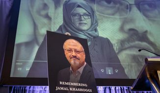 FILE - In this Friday, Nov. 2, 2018 file photo, a video image of Hatice Cengiz, fiancee of slain Saudi journalist Jamal Khashoggi, is played during an event to remember Khashoggi, who was killed inside the Saudi Consulate in Istanbul on Oct. 2, in Washington. Saud Al-Mojeb, Saudi Arabia’s top prosecutor, is recommending the death penalty for five suspects charged with ordering and carrying out the killing of Saudi writer Jamal Khashoggi. Al-Mojeb told a press conference in Riyadh Thursday, Nov. 15, 2018,  that Khashoggi’s killers had been planning the operation since September 29, three days before he was killed inside the kingdom’s consulate in Istanbul. (AP Photo/J. Scott Applewhite, File)