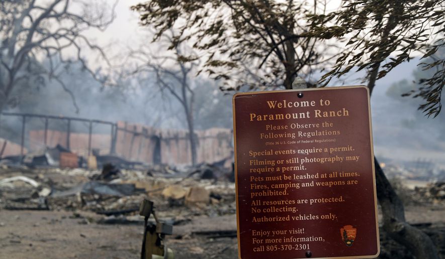 This Friday, Nov. 9, 2018 file photo shows Paramount Ranch, a frontier western town built as a movie set that appeared in countless movies and TV shows, after it was decimated by the Woolsey fire in Agoura Hills, Calif. Southern Californians faced with the loss of lives and homes in a huge wildfire are also grappling with the destruction of public lands popular with hikers, horseback riders and mountain bikers. The Woolsey fire has charred more than 83 percent of National Park Service land within the Santa Monica Mountain National Recreational Area. (AP Photo/Marcio Jose Sanchez)