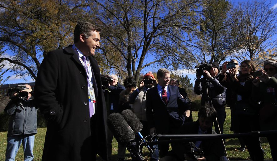 CNN&#39;s Jim Acosta speaks to journalists on the North Lawn upon returning back to the White House in Washington, Friday, Nov. 16, 2018. U.S. District Court Judge Timothy Kelly ordered the White House to immediately return Acosta&#39;s credentials. He found that Acosta was &quot;irreparably harmed&quot; and dismissed the government&#39;s argument that CNN could send another reporter in Acosta&#39;s place to cover the White House. (AP Photo/Manuel Balce Ceneta)