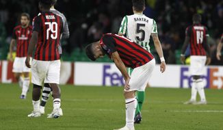 FILE - In this Thursday, Nov. 8, 2018 file photo, AC Milan&#39;s Patrick Cutrone reacts at the end of the Europa League, Group F soccer match between AC Milan and Betis, at the Benito Villamarin Stadium in Seville, Spain. AC Milan is preparing for another hearing before UEFA&#39;s club finance panel next week. In July, the Court of Arbitration for Sport in July overturned a ban imposed on the seven-time European champion for overspending. CAS said the one-year exclusion from European competition was too harsh considering Milan&#39;s recent takeover by U.S.-based hedge fund Elliott Management. (AP Photo/Manuel Gomez, File)