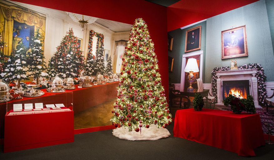 Decorations from the East Room are displayed at a Christmas exhibit at The George W. Bush Presidential Center and Library on Thursday, Nov. 15, 2018 on the SMU campus in Dallas. The exhibit, called "Deck the Halls and Welcome All: Christmas at the White House 2006," opened Thursday and runs through Jan. 6. (Ashley Landis /The Dallas Morning News via AP)