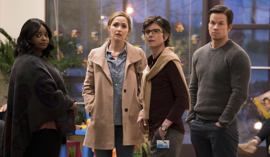 This image released by Paramount Pictures shows Octavia Spencer, from left, Rose Byrne, Tig Notaro and Mark Wahlberg in a scene from &amp;quot;Instant Family.&amp;quot; Wahlberg may be known for his tough guy image thanks to movies including “Mile 22” and “The Departed,” or for his straight up comedic roles like in “Ted,” but he tugs at the heartstrings in his latest movie “Instant Family.” Out Friday, it stars Wahlberg and Rose Byrne as spouses adopt three siblings. The story is based on director and co-writer Sean Anders’ own adoption experience. (Hopper Stone/Paramount Pictures via AP)