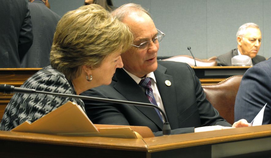 Sen. Sharon Hewitt, R-Slidell, left, and Rep. Tony Bacala, R-Prairieville, talk about a Medicaid audit during a Joint Legislative Committee on the budget hearing on Friday, Nov. 16, 2018, in Baton Rouge, La. (AP Photo/Melinda Deslatte)