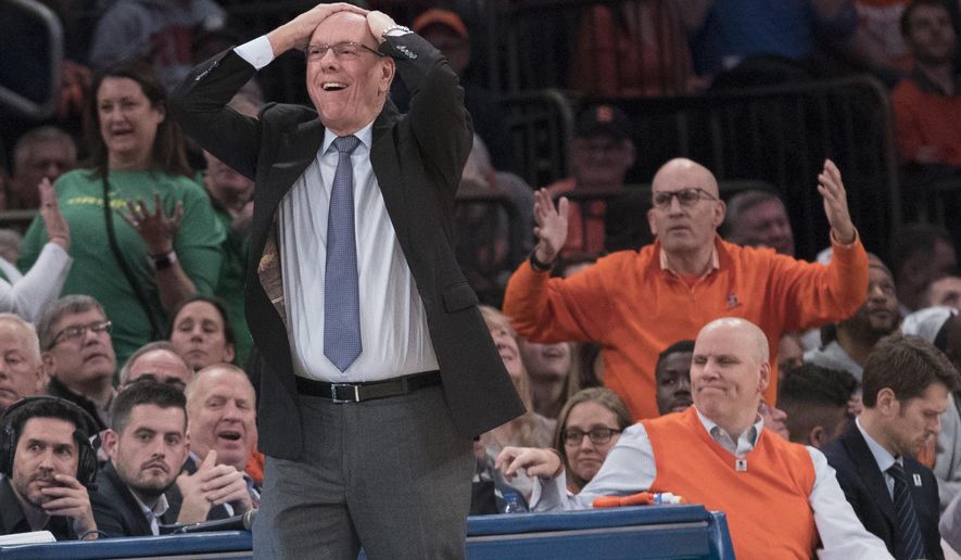 Syracuse head coach Jim Boeheim, foreground, reacts during the second half of an NCAA college basketball consolation game against Oregon in the 2K Empire Classic, Friday, Nov. 16, 2018, at Madison Square Garden in New York. (AP Photo/Mary Altaffer)
