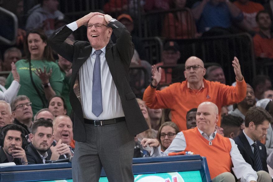 Syracuse head coach Jim Boeheim, foreground, reacts during the second half of an NCAA college basketball consolation game against Oregon in the 2K Empire Classic, Friday, Nov. 16, 2018, at Madison Square Garden in New York. (AP Photo/Mary Altaffer)