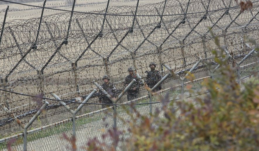 South Korean army soldiers patrol along the barbed-wire fence in Paju, South Korea, near the border with North Korea, Friday, Nov. 16, 2018. North Korean leader Kim Jong Un observed the successful test of &amp;quot;a newly developed ultramodern tactical weapon,&amp;quot; the nation&#x27;s state media reported Friday, though it didn&#x27;t describe what sort of weapon it was.(AP Photo/Ahn Young-joon)