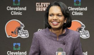FILE- In this Oct. 21, 2010, file photo former Secretary of State Condoleezza Rice talks with the media after visiting with the Cleveland Browns coaches and players at the Browns training facility in Berea, Ohio. Browns general manager John Dorsey says the team has not discussed Rice as a candidate for its coaching vacancy. Rice is an avid Browns fan and has visited the team&#39;s headquarters on numerous occasions in recent years. (AP Photo/Amy Sancetta, File)