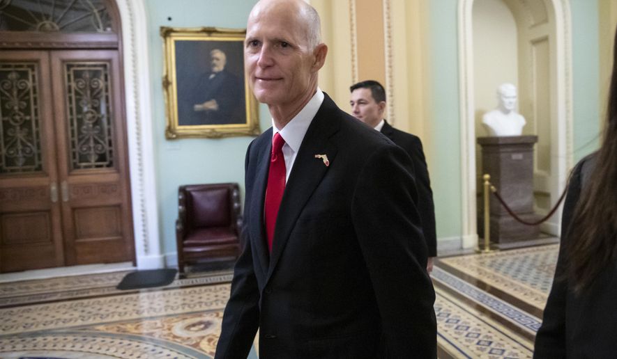 In this Wednesday, Nov. 14, 2018, file photo Florida Gov. Rick Scott arrives for a meeting with Majority Leader Mitch McConnell, R-Ky., and new GOP senators at the Capitol in Washington. Scott is leading incumbent Sen. Bill Nelson in the state’s contentious Senate race. Official results posted by the state on Sunday, Nov. 18, showed Scott ahead of Nelson following legally-required hand and machine recounts. State officials will certify the final totals on Tuesday. (AP Photo/J. Scott Applewhite, File)