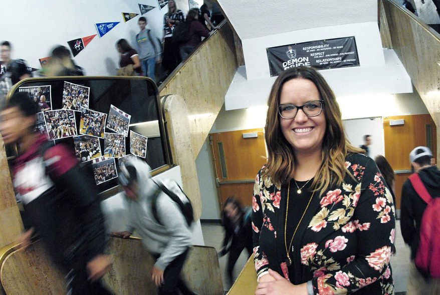 ADVANCE FOR USE MONDAY, NOV. 19, AND THEREAFTER Megan Kraft, a clinical physiologist at The Village in Bismarck, N.D., visits Bismarck High School once a week to help referred students with a range of mental health issues from stress to anxiety and depression. Photo taken on 10-17-2018. (Mike McCleary/The Bismarck Tribune via AP)