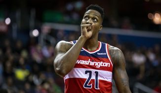 Washington Wizards center Dwight Howard looks at the scoreboard during the first half of the team&#39;s NBA basketball game against the Portland Trail Blazers on Sunday, Nov. 18, 2018, in Washington. (AP Photo/Al Drago) ** FILE **