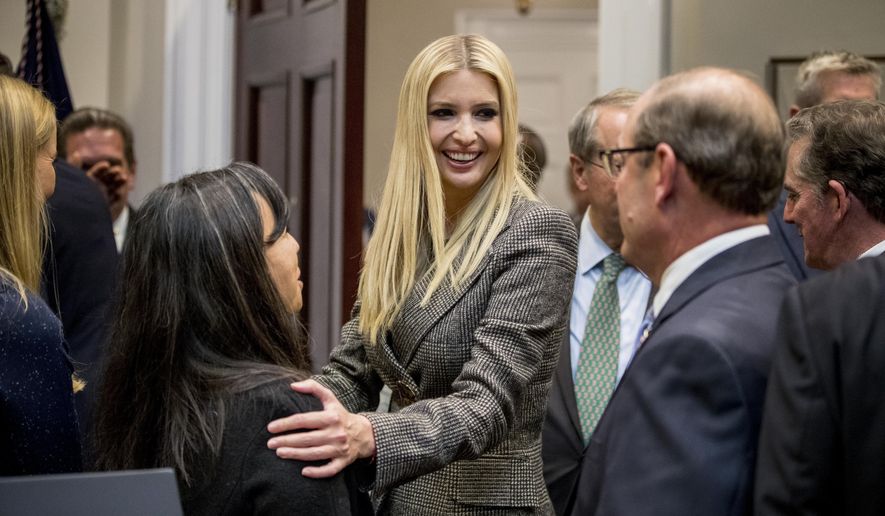 In this Nov. 14, 2018, photo, Ivanka Trump, the daughter of President Donald Trump, center, greets guests after President Donald Trump spoke about prison reform in the Roosevelt Room of the White House in Washington. Ivanka Trump, the president’s daughter and adviser, sent hundreds of emails about government business from a personal email account last year. That’s according to the Washington Post, which reports the emails were sent to other White House aides, Cabinet officials and her assistants. (AP Photo/Andrew Harnik)