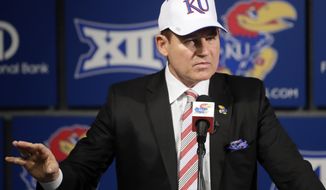 University of Kansas new football coach Les Miles makes a statement during a news conference in Lawrence, Kan., Sunday, Nov. 18, 2018. (AP Photo/Orlin Wagner)