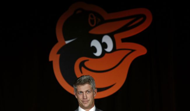 Mike Elias, the Baltimore Orioles&#x27; new executive vice president and general manager, speaks at baseball a news conference, Monday, Nov. 19, 2018, in Baltimore. (AP Photo/Patrick Semansky)